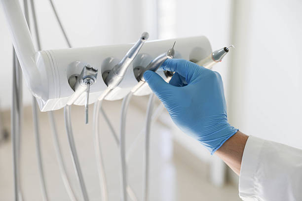 Professional Emergency Dentist technician working in Glens Falls, NY